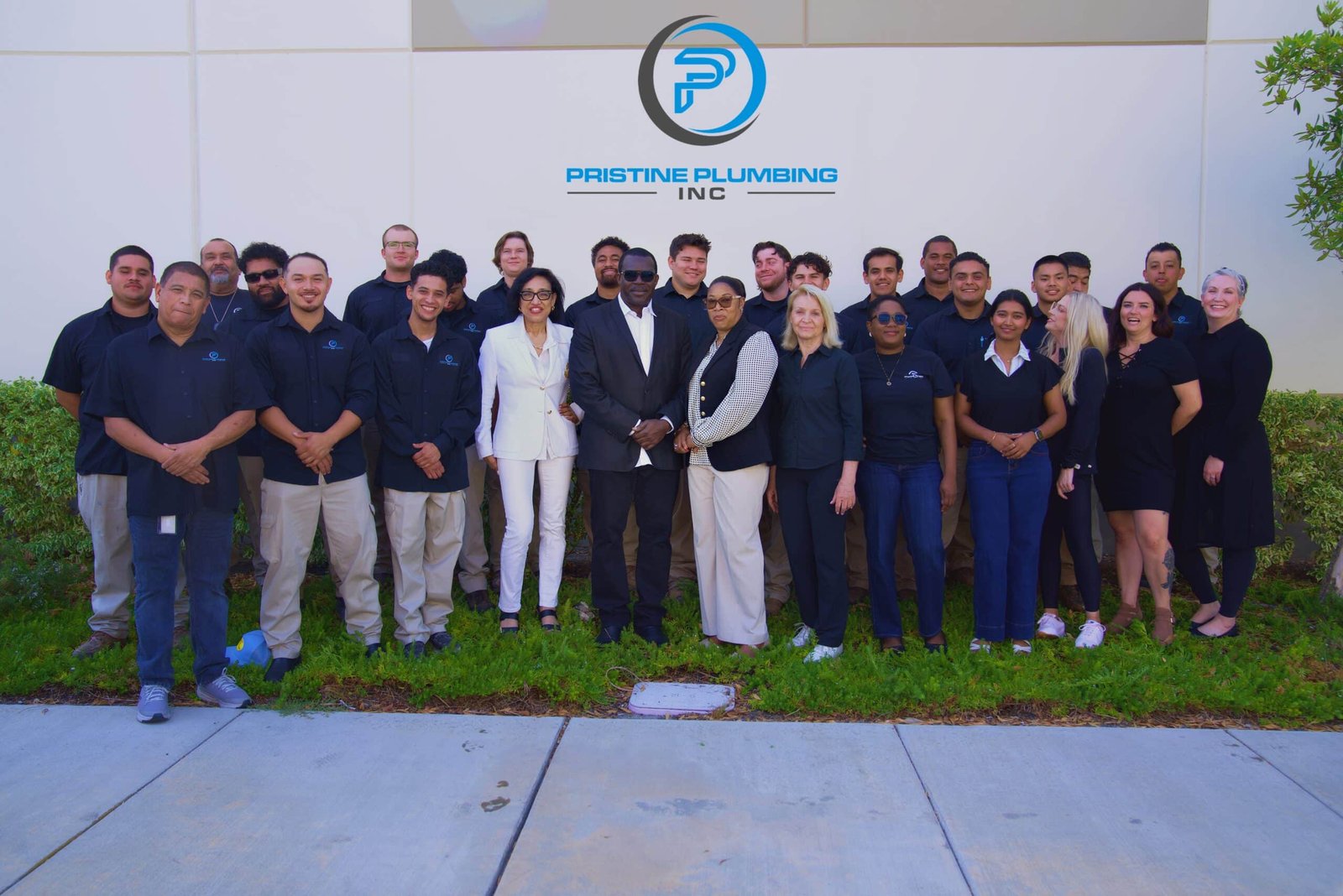 Group photo of Orange County plumbing company employees